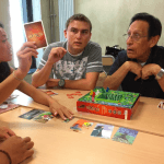 Students play a card game