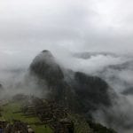 Fog envelops the mountainous landscape of Maccu Picchu