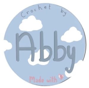 A grey circle and clouds logo that reads, Crochet by Abby, Made with Love